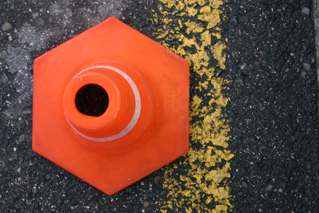 birds eye view of a traffic cone on a road